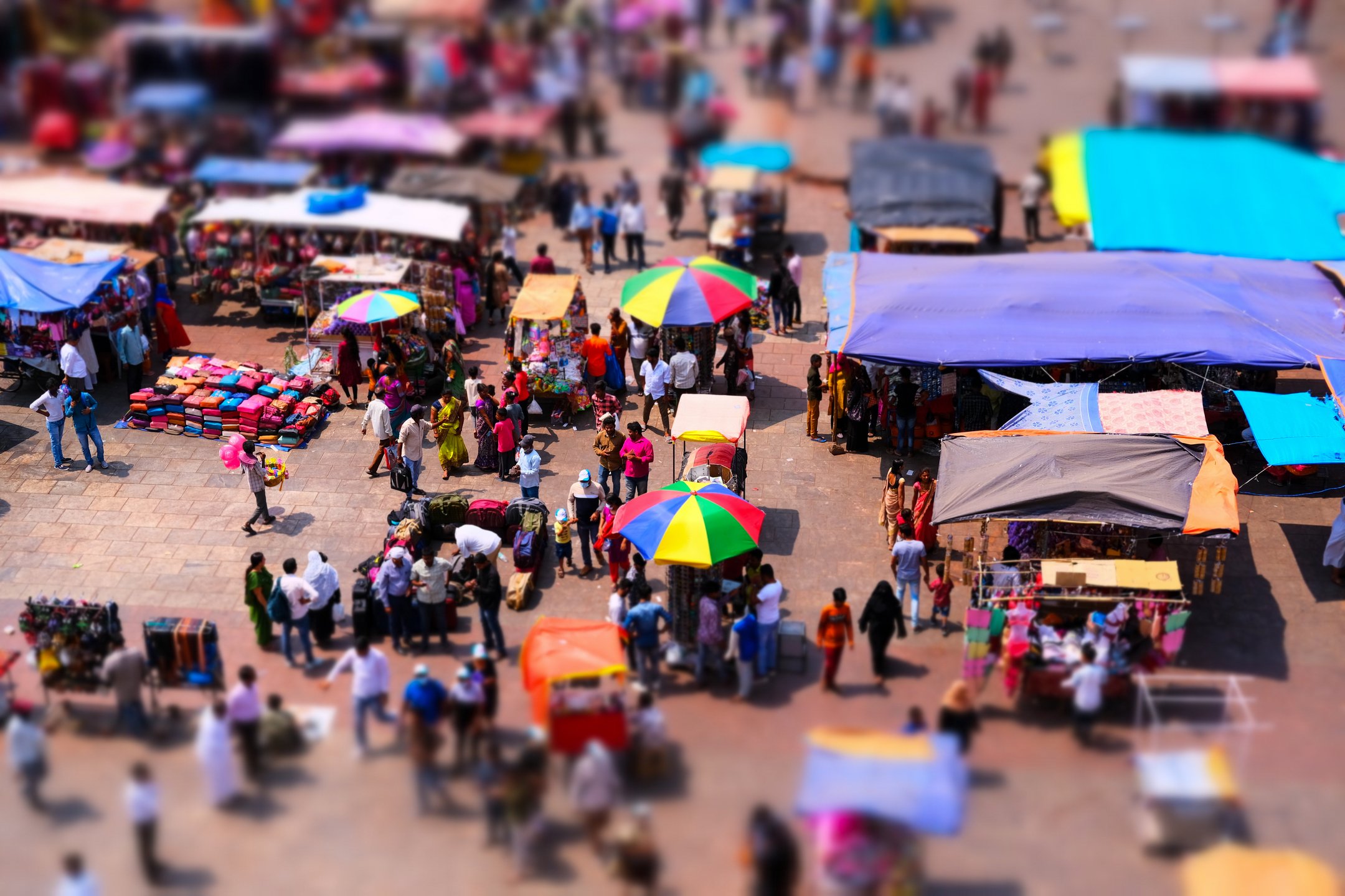 Photos from up in Charminar, pedestrians and market stalls. Tilt